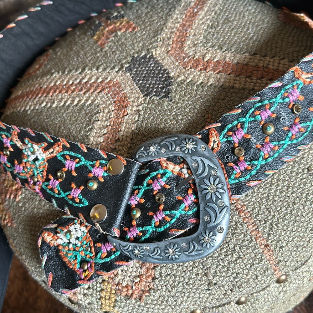 Embroidered steer heads and embezzled black colorful belt